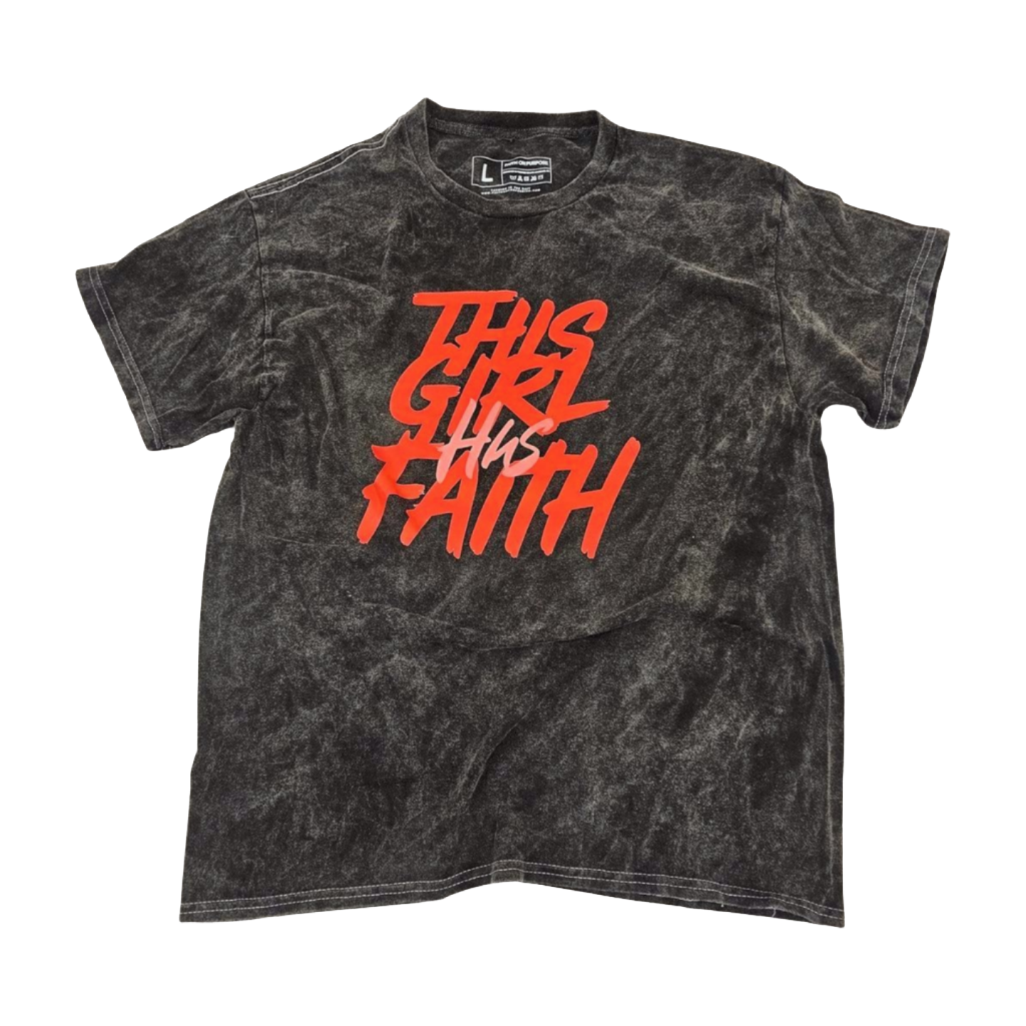 Black/grey mineral wash short-sleeve T-shirt laid flat, featuring bold red and pink text on the front that reads ‘This Girl Has Faith