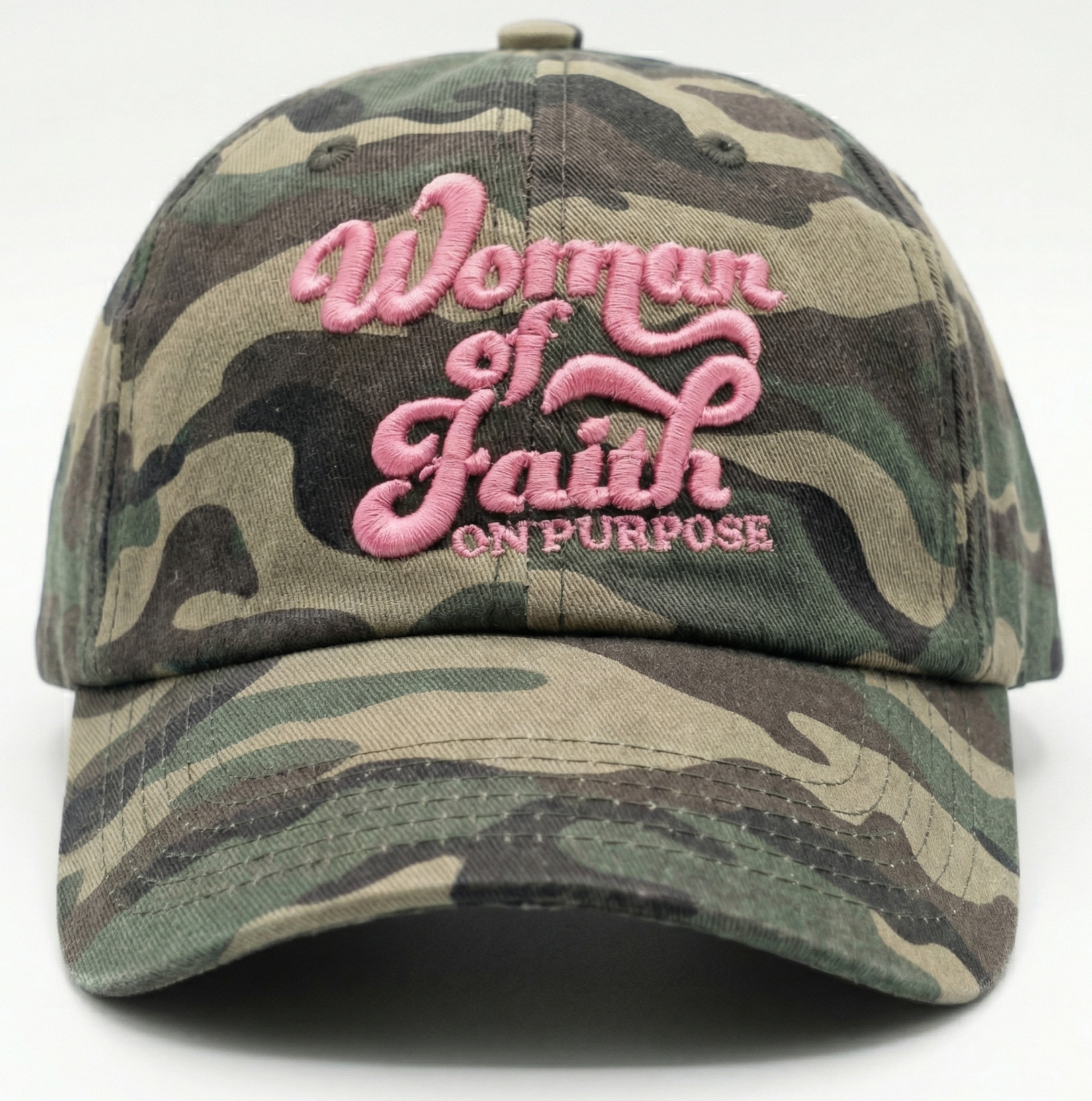 Pink and grey camo hat with bold 'Woman of Faith On Purpose' embroidery, a sturdy daily uniform for intentional living.