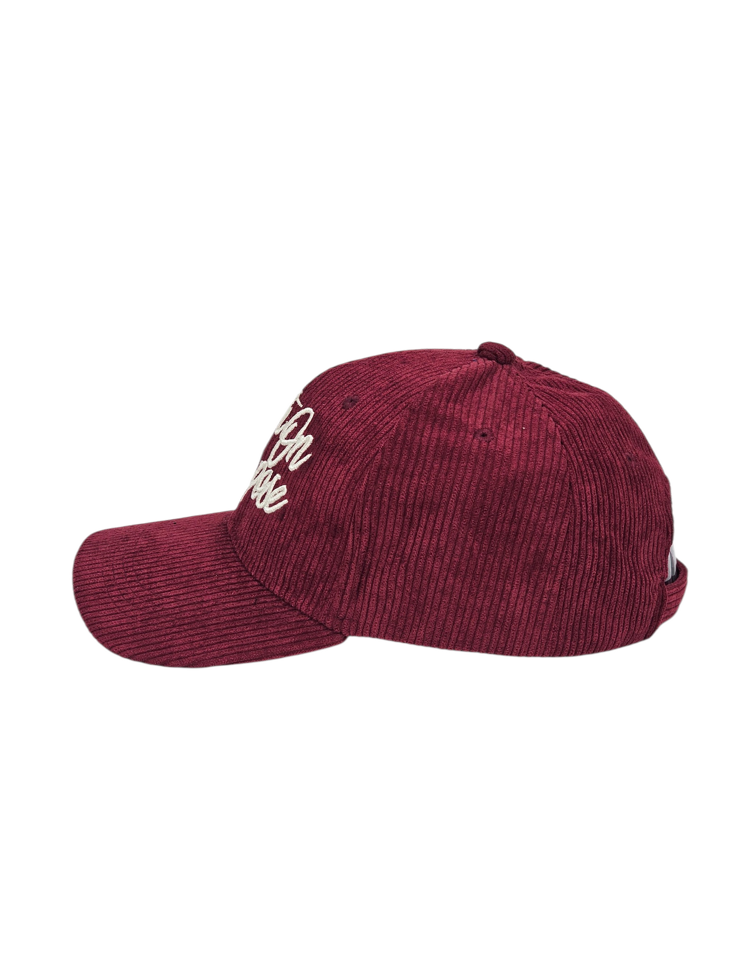 Maroon cap with white text on a white background