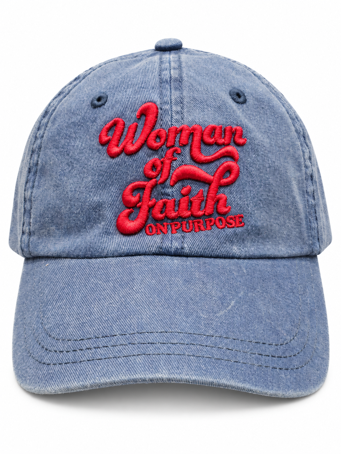 A blue denim baseball cap featuring red embroidered text on the front that reads 'Woman of Faith ON PURPOSE'.