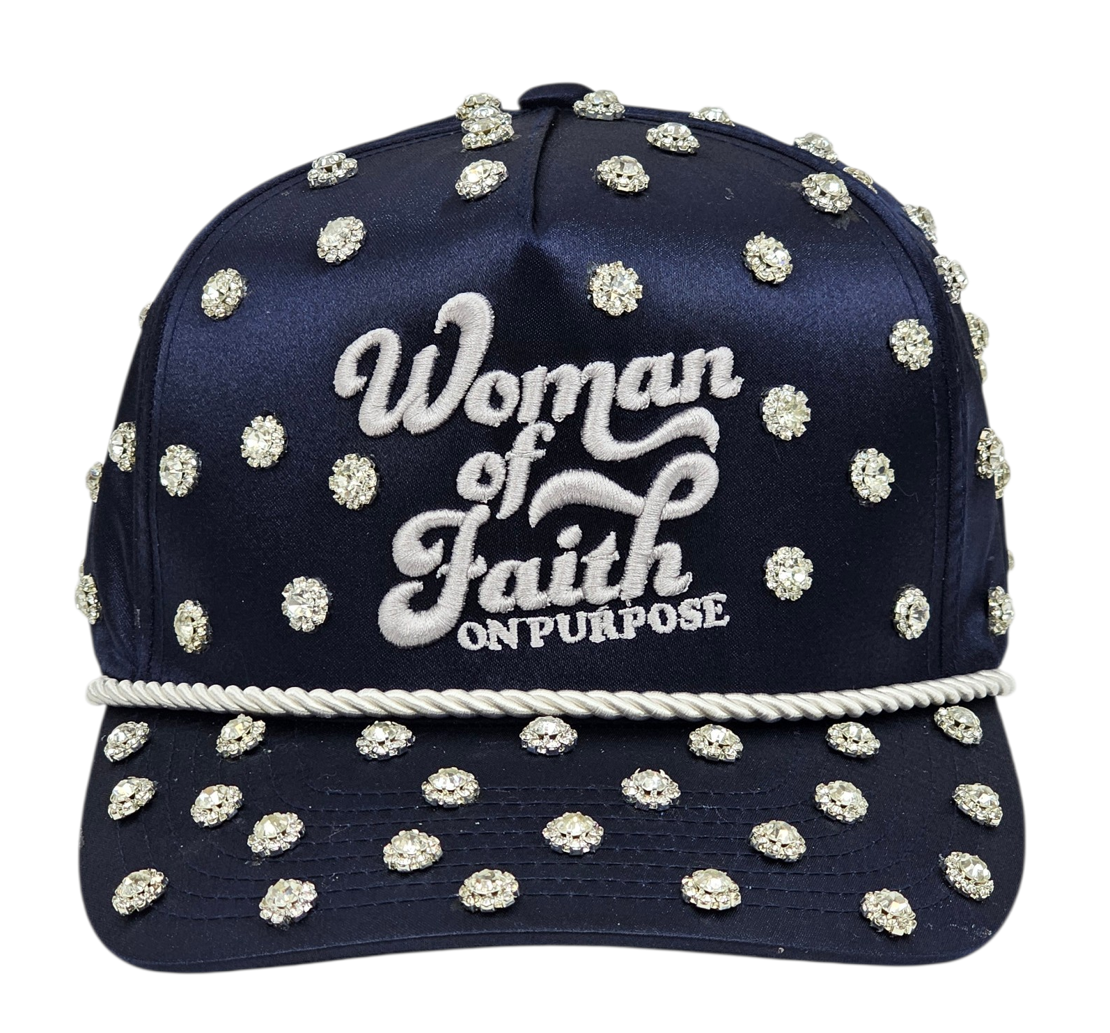 Navy blue cap with white embellishments and 'Woman of Faith On Purpose' text on a white background
